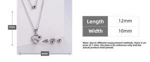 Detail of silver titanium heart pendant necklace and ball earrings set with dimensions
