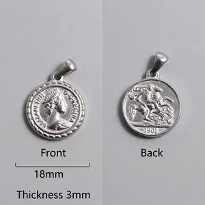Detail showing 18mm Roman coin pendant with Queen portrait and St. George engraving