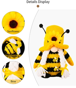 Detailansicht eines Hummel-Gnomes mit Sonnenblumenhut und dekorativer Bienenschleife