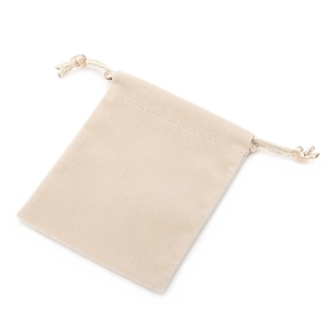 Minimalist beige velvet jewelry drawstring pouch with a soft texture and elegant finish