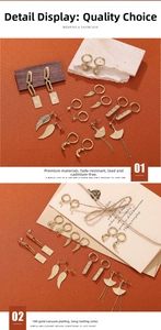 Detail of 18K gold vacuum plated stainless steel earrings with moon and star charms