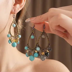 Bohemian dangle earrings with turquoise and marble beads in vintage bronze finish