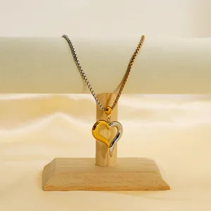 Two-tone 18K gold plated stainless steel slanted heart pendant on a box chain necklace