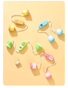 Detailed overhead view of portable neck fans in four colors with cute cartoon designs