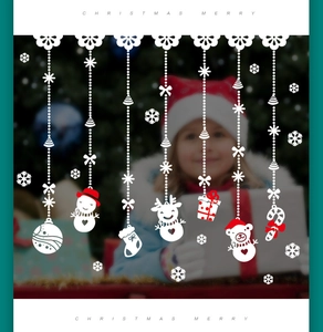 White Christmas window decals featuring snowmen, reindeer, and snowflakes decorations