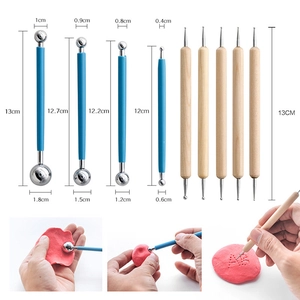 Detail view of double-ended clay modeling tools and indentation pens for pottery crafts