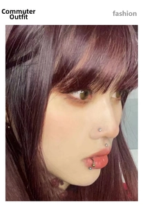 Detailed view of stainless steel heart nose studs and body piercing set on a female model