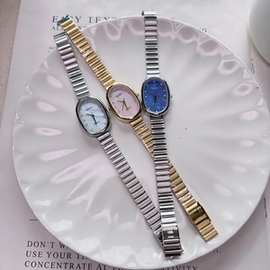 Set of three elegant NAIDU women's quartz watches with oval mother-of-pearl dials