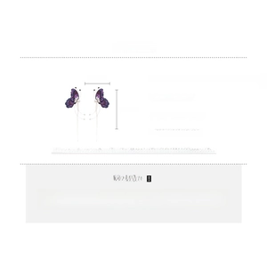 Detailed specs of purple fabric butterfly earrings with zircon, pearls and tassel