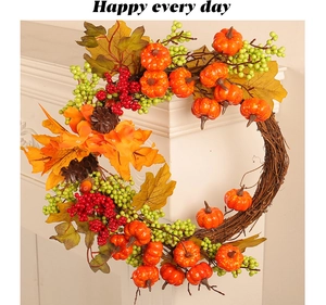 Detailed close-up of autumn wreath with mini pumpkins, maple leaves, and berries on a fireplace