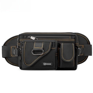 Detail of durable black nylon crossbody bag with orange stitching and multi-pocket design