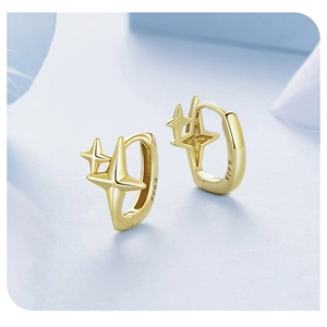 Detailed close-up showing the S925 sterling silver hallmark on the gold star earring