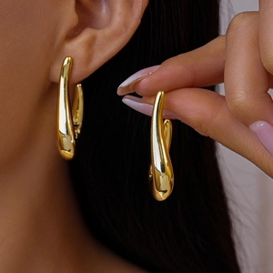 Polished gold U-shaped droplet earrings with minimalist teardrop design for women