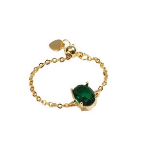 Adjustable gold chain ring featuring an oval emerald-green zircon and heart pendant