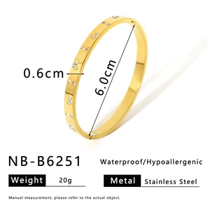 Detail showing 6.0cm inner diameter and 0.6cm width of gold crystal stainless steel bangle