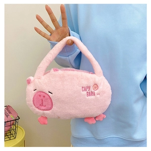 Pink plush Capybara handbag featuring soft texture and CAPY BARA embroidery detail