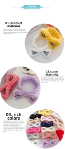 Detail of OMG embroidered flannel headband with soft texture and elastic bow design
