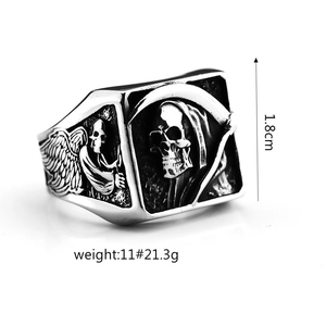 Retro stainless steel gothic skull ring with vintage reaper relief detail in 45-degree view