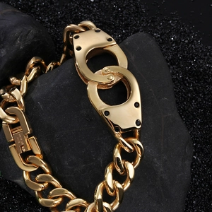 Gold stainless steel hip hop bracelet with double handcuff link and chunky cuban chain