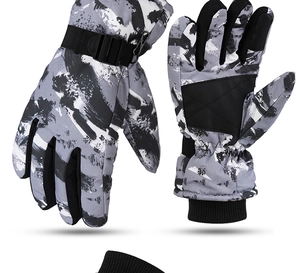 Waterproof grey camo ski gloves showing palm grip and adjustable wrist straps for winter sports