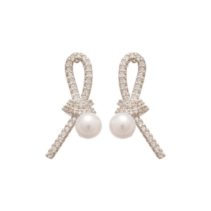 Silver knot stud earrings with pave crystals and hanging pearls on white background