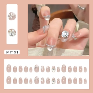 French cat-eye press-on nails with pearls, 3D flowers and glitter gradient design