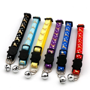 Six colorful nylon cat collars with gold moon and star patterns and cat-shaped buckles