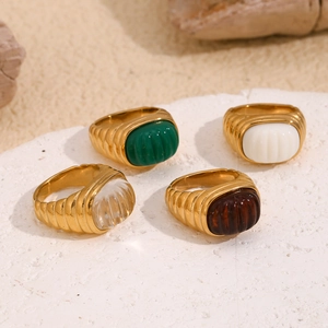 18K gold plated stainless steel rings with colorful oval acrylic stones on stone base
