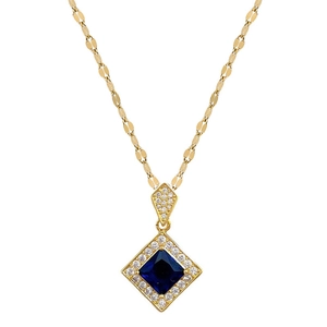 Gold necklace with square blue gemstone pendant and crystal halo on white background