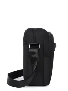 Waterproof black nylon crossbody bag for men with multiple zipper compartments and strap