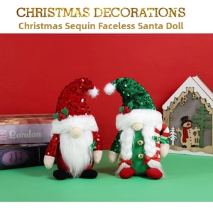 Close-up of red and green Christmas gnomes with sequin hats and fluffy white beards
