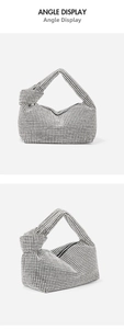 Macro display of the knotted handle and dense rhinestone texture on the silver hobo bag