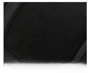 Close-up of black wool blend fabric texture for warm winter flat cap insulation