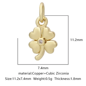 Detailed view of a gold clover pendant with cubic zirconia and size 11.2x7.4mm dimensions