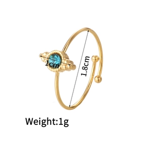 Detail view of gold stainless steel ring with blue stone showing 1.8cm diameter and 1g weight