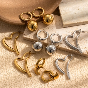 Minimalist moon and heart stainless steel hoop earrings in gold and silver finishes
