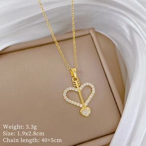 Detail of cupid's arrow heart necklace with zircon inlay and product size specifications