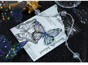 Detail of laser holographic PET butterfly stickers with shimmering pearlescent finish