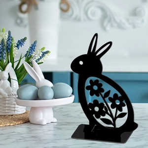 Easter bunny hollow ornament with floral patterns on marble countertop for festive decor