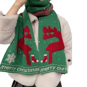 Green knit scarf with reindeer patterns and Merry Christmas text for festive winter wear