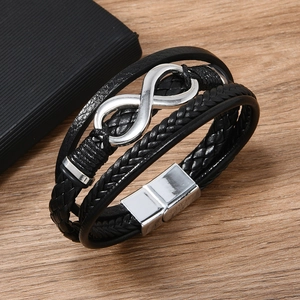 Multi-layer black leather bracelet featuring a silver infinity charm and magnetic clasp