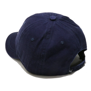 Detail view of navy cotton baseball cap showing back strap and JC embroidery logo