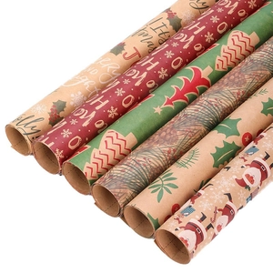 Set of 6 rolls of vintage Christmas wrapping paper with festive Santa and tree patterns