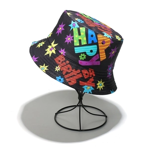 Black cotton bucket hat with colorful Happy Birthday graffiti print and festive stars