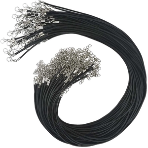 Detail of bulk black waxed cord necklaces with silver lobster clasps and extension chains