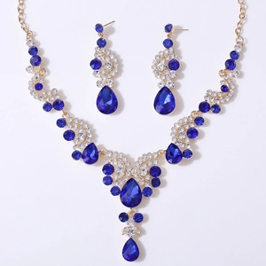 Luxury gold bridal jewelry set with pear-cut navy blue crystals and necklaces for wedding gowns