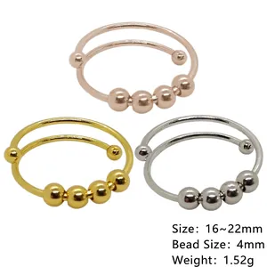 Adjustable stainless steel anti-anxiety ring with spinning beads in gold and silver