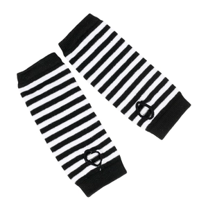 Detail of knit striped arm warmers with thumb holes and black and white gothic pattern