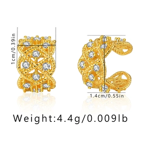 Detail view of gold-plated braided cuff earring with dimensions 1.4cm by 1cm