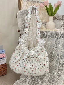 Floral lace shoulder bag with rose embroidery and ruffled straps in a vintage style